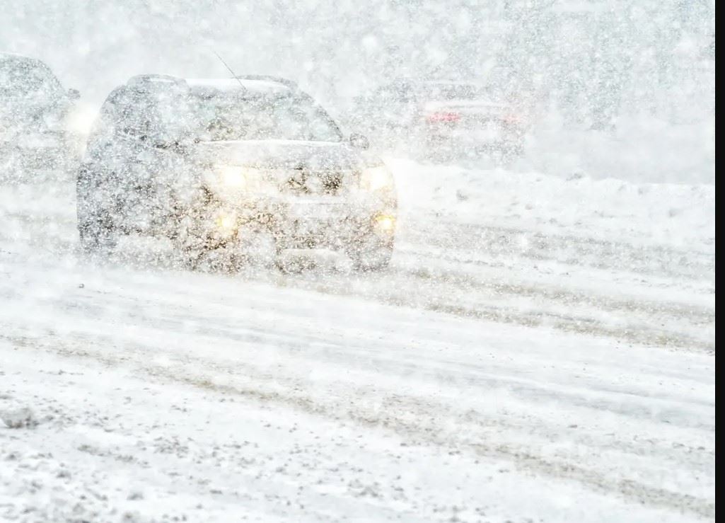Car driving in whiteout conditions